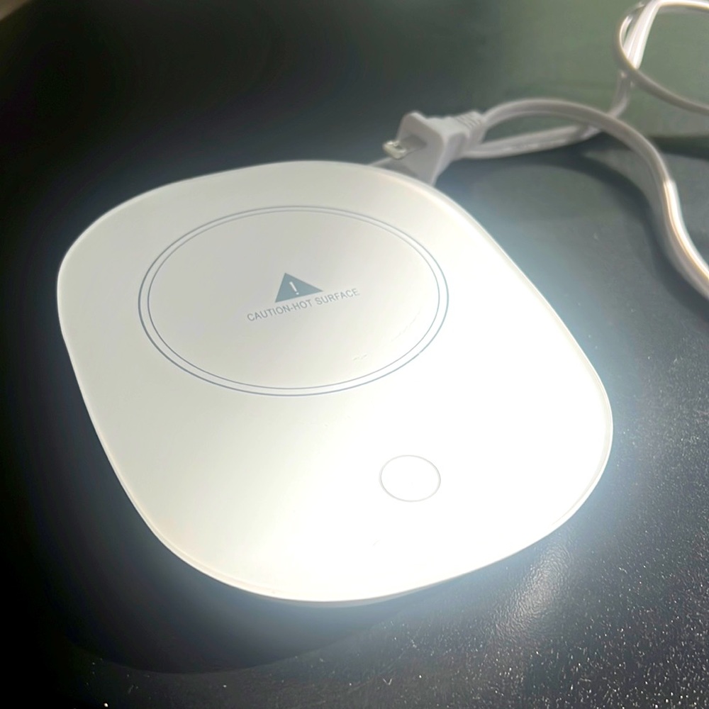 Cup warmer; stylish, small and keeps your beverage warm